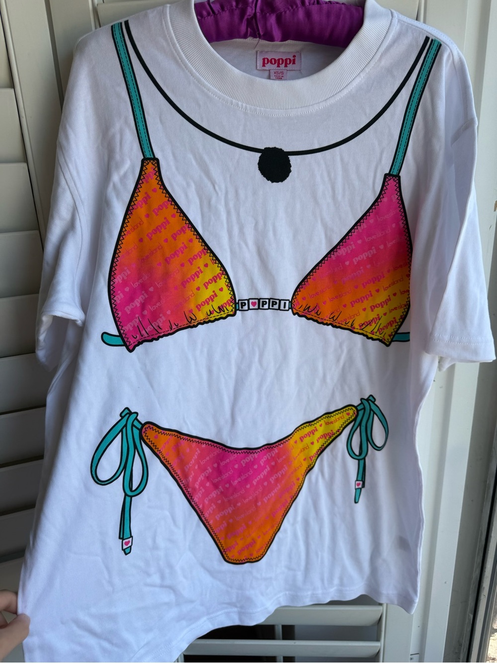 Poppi x Love IslandWomen's White Tee with Pink and Orange Bikini Graphic